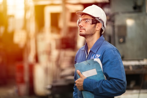 industrial worker with hardhat and eye protection glasses