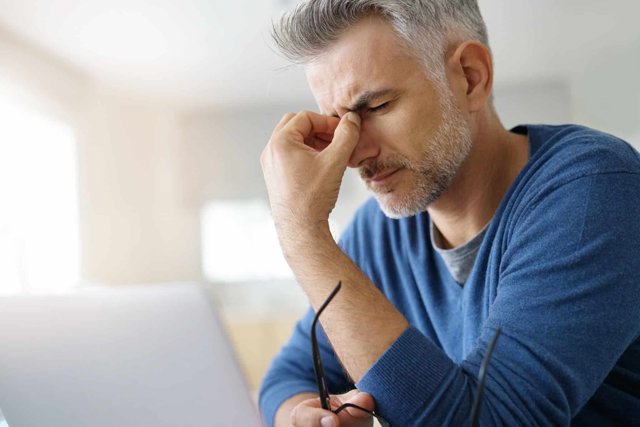 Man,At,Home,Having,A,Headache,In,Front,Of,Laptop Ocular Migraine Chesapeake VA